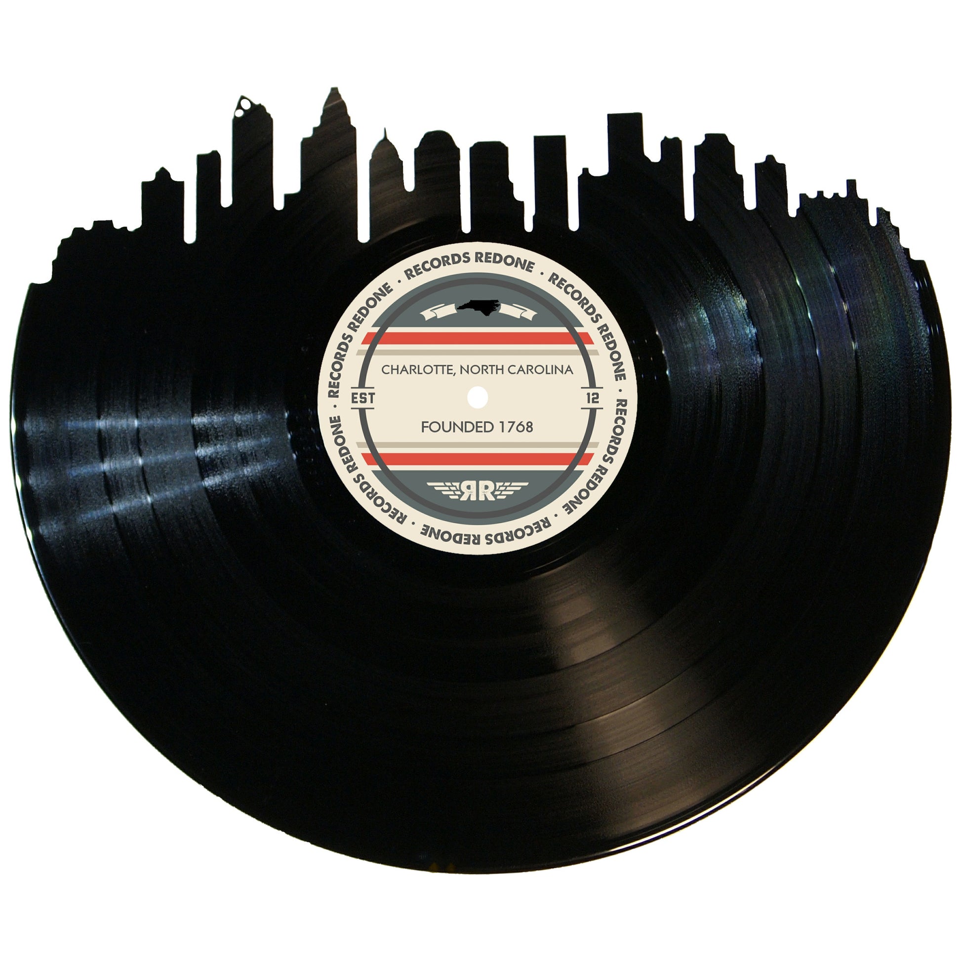 Handcrafted vinyl record art of the Charlotte, NC skyline, perfect for gallery walls and unique gifts.