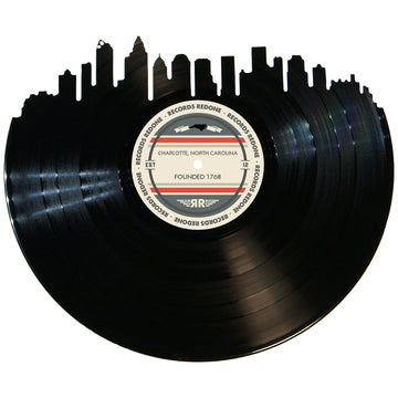 Handcrafted vinyl record art of the Charlotte, NC skyline, perfect for gallery walls and unique gifts.