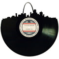 Handcrafted vinyl record art of the St. Louis skyline, perfect for gallery walls and unique gifts.